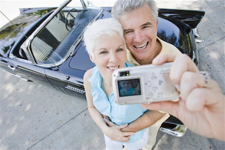 Couple Taking Self Portrait By Car Stock Photo - Rights-Managed, Code: 700-01753643