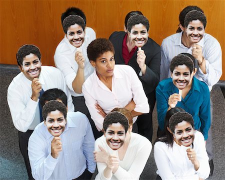 standout - Businesswoman Surrounded by People with Identical Masks Stock Photo - Rights-Managed, Code: 700-01764234