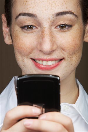 Woman with Cellular Phone Stock Photo - Rights-Managed, Code: 700-01764276