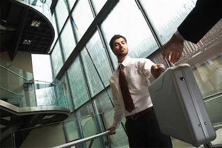 Businessmen Exchanging Briefcase Stock Photo - Rights-Managed, Code: 700-01764285