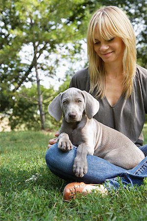 puppy in the park - Dog on Woman's Lap in Park Stock Photo - Rights-Managed, Code: 700-01764869