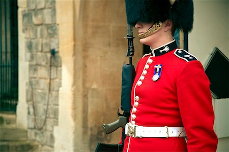 english guards uniform - Portrait of Queen's Guard, Windsor Castle, England Stock Photo - Rights-Managed, Code: 700-01765092