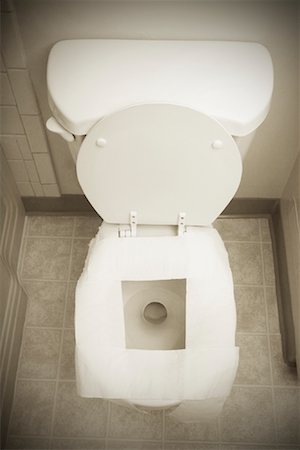 Paper on Toilet Seat Stock Photo - Rights-Managed, Code: 700-01787519