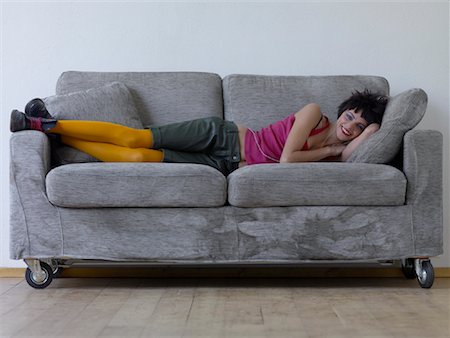 Woman on Couch Stock Photo - Rights-Managed, Code: 700-01788306
