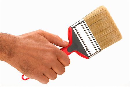 Hand Holding Paintbrush Stock Photo - Rights-Managed, Code: 700-01788779