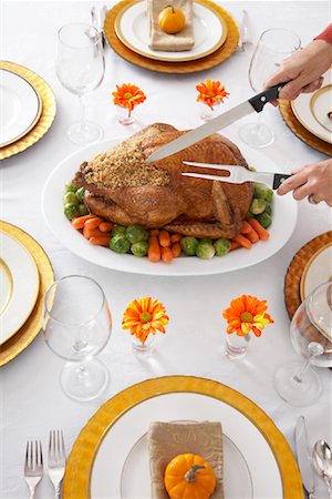 fine dining table setting with glasses - Woman Carving Turkey Stock Photo - Rights-Managed, Code: 700-01788881