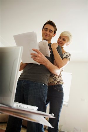 person and lap top and cut out - Couple Looking at Bills Stock Photo - Rights-Managed, Code: 700-01792297