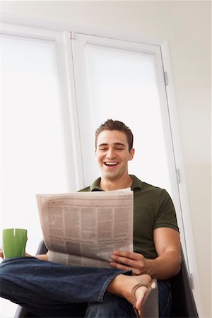 flip flop man - Man Reading Newspaper Stock Photo - Rights-Managed, Code: 700-01792320