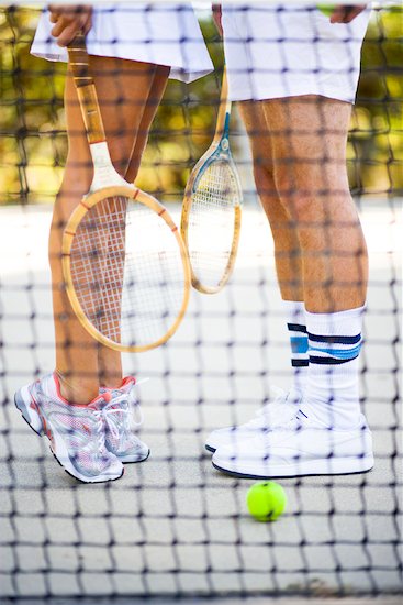 Couple Playing Tennis Stock Photo - Premium Rights-Managed, Artist: Ty Milford, Image code: 700-01837403