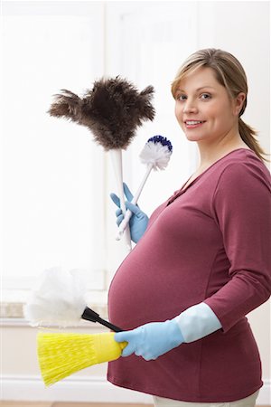 portrait rubber gloves - Pregnant Woman Doing Housework Stock Photo - Rights-Managed, Code: 700-01837418