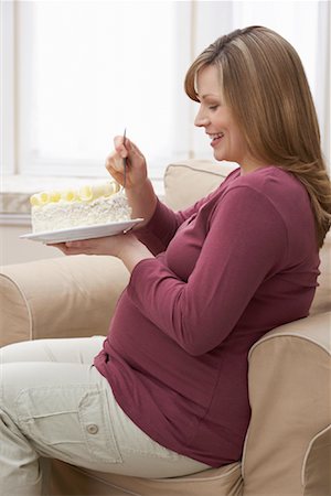 Pregnant Woman Eating Cake Stock Photo - Rights-Managed, Code: 700-01837412