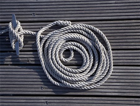 rope in wood - Coil of Rope on Dock Stock Photo - Rights-Managed, Code: 700-01837819