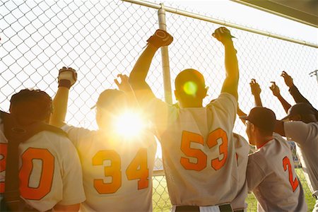 Baseball-Spieler jubeln im Dugout Stockbilder - Lizenzpflichtiges, Bildnummer: 700-01838358