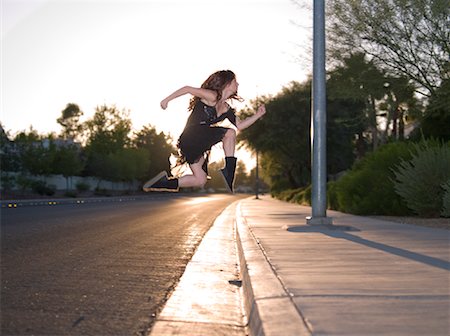 simsearch:600-02346565,k - Woman Dancing on the Street, Las Vegas, Nevada, USA Fotografie stock - Rights-Managed, Codice: 700-01878972