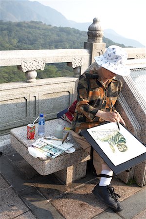 Woman on Bench Painting, Po Lin Monastery, Lantau Island, Hong Kong, China Foto de stock - Con derechos protegidos, Código: 700-01879093
