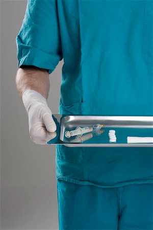 Doctor Holding Tray Photographie de stock - Rights-Managed, Code: 700-01879257