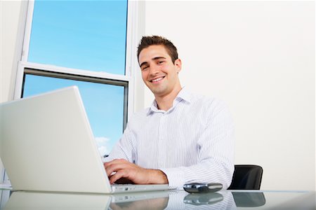 desktop - Businessman at Desk Stock Photo - Rights-Managed, Code: 700-01879472