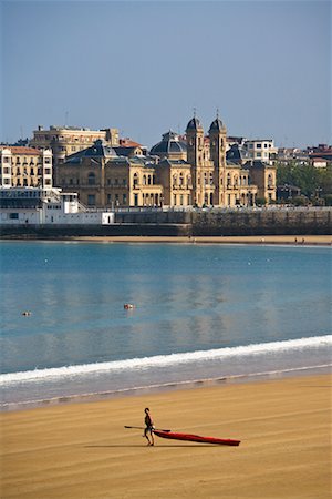 simsearch:700-02429241,k - Person with Kayak on La Concha Beach, San Sebastian, Spain Stock Photo - Rights-Managed, Code: 700-01879680