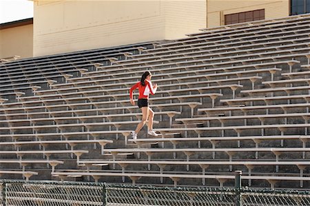 simsearch:700-02063983,k - Athlete Running Up Bleacher Steps Stock Photo - Rights-Managed, Code: 700-01880228