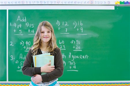 Portrait of Student in Classroom Foto de stock - Con derechos protegidos, Código: 700-01954549