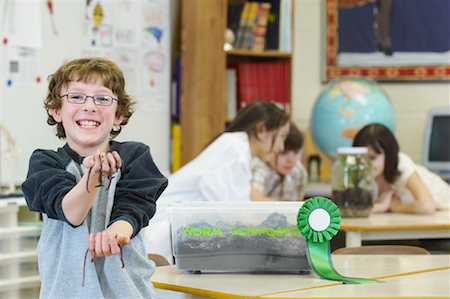 Student With Award-Winning Worm Composting Science Project Foto de stock - Con derechos protegidos, Código: 700-01954572