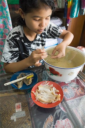 Girl Cleaning Bird Nests, Jakarta, Java, Indonesia Stock Photo - Rights-Managed, Code: 700-01954892