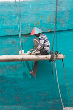 Man Repairing Ship, Sunda Kelapa, North Jakarta, Jakarta, Java, Indonesia Stock Photo - Rights-Managed, Code: 700-01954893