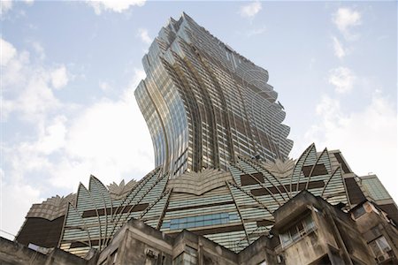 entertainment district - The Grand Lisboa Behind Old Apartment Building, Macau, China Stock Photo - Rights-Managed, Code: 700-01954949