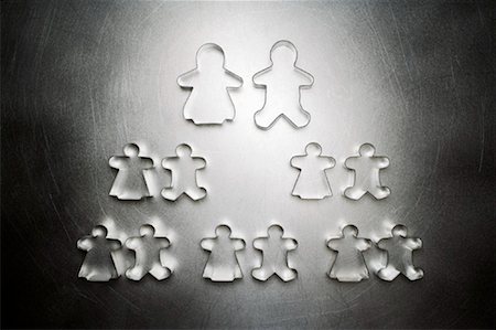 reação em cadeia - Gingerbread Men and Gingerbread Women Cookie Cutters, Family Tree Foto de stock - Direito Controlado, Número: 700-01955423