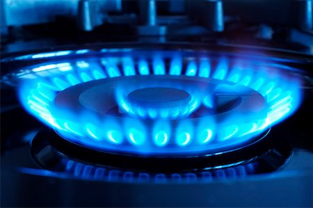 power glowing blue - Close-up of Gas Stove Stock Photo - Rights-Managed, Code: 700-01955769
