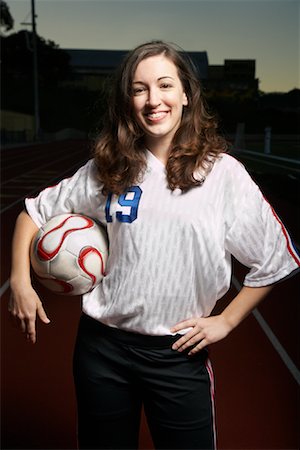 soccer player holding ball - Female Soccer Player Stock Photo - Rights-Managed, Code: 700-02010480