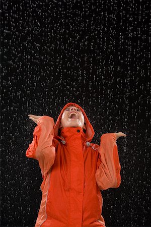 raincoat hood - Woman in Rain Stock Photo - Rights-Managed, Code: 700-02010530