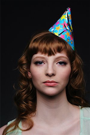 simsearch:700-02669997,k - Portrait of Woman in Birthday Hat Fotografie stock - Rights-Managed, Codice: 700-02010633