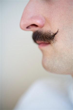 shannon mendes - Close-up of Man's Nose and Moustache Foto de stock - Con derechos protegidos, Código: 700-02046063