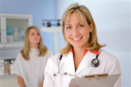 Portrait of Doctor With Patient Foto de stock - Con derechos protegidos, Código: 700-02046375