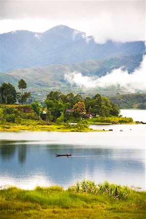 sumatra - Fisherman on Lake, Danau Kembar, Sumatra, Indonesia Foto de stock - Con derechos protegidos, Código: 700-02046605