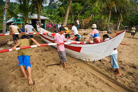 proa - Gens de halage bateau de pêche, la baie Bungus, Sumatra, Indonésie Photographie de stock - Rights-Managed, Code: 700-02046614