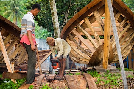 person bow boat - Boat Builders Working, Bungus Bay, Sumatra, Indonesia Stock Photo - Rights-Managed, Code: 700-02046613