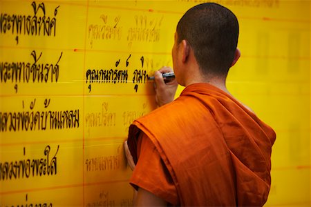 Monk Writing on Display Board, Chiang Rai, Thailand Stock Photo - Rights-Managed, Code: 700-02047021