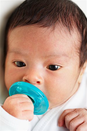 Portrait of Baby with soother Foto de stock - Con derechos protegidos, Código: 700-02047062