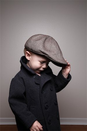 Crying Boy in Jacket and Hat Stock Photo - Rights-Managed, Code: 700-02056638
