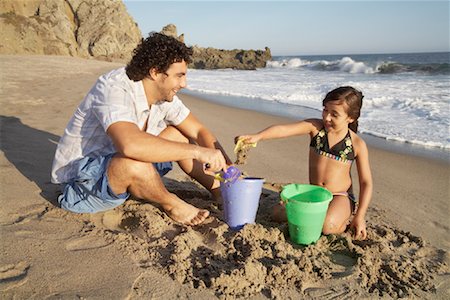 Father and Daughter Playing on Beach, Malibu, California, USA Stock Photo - Rights-Managed, Code: 700-02056700