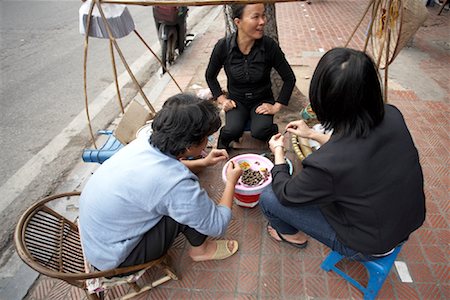 People Eating by Street Vendor, Hanoi, Vietnam Stock Photo - Rights-Managed, Code: 700-02063634