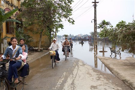 rain in the rivers - People Bicycling on Street, Hoi An, Vietnam Stock Photo - Rights-Managed, Code: 700-02063643