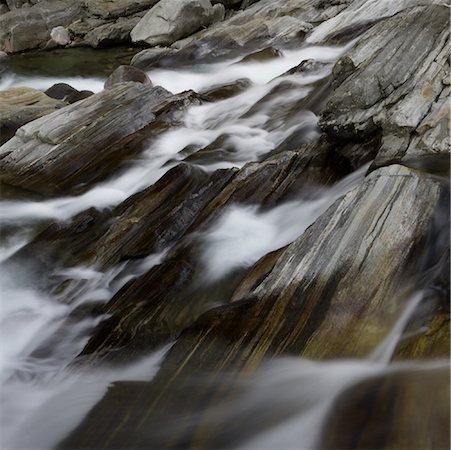 rushing water - Close-up of Water Flowing Over Rocks, Near Lavertezzo, Valle Verzasca, Locarno District, Ticino, Switzerland Stock Photo - Rights-Managed, Code: 700-02063821