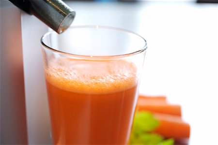 exprimidor de jugo - Glass of Carrot Juice Foto de stock - Con derechos protegidos, Código: 700-02063933