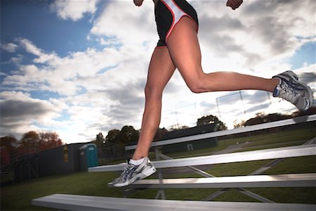 shorts athletic wear - Woman Exercising on Bleachers Stock Photo - Rights-Managed, Code: 700-02063985