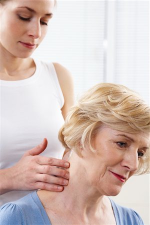 Woman Getting Neck Massaged Foto de stock - Con derechos protegidos, Código: 700-02071760