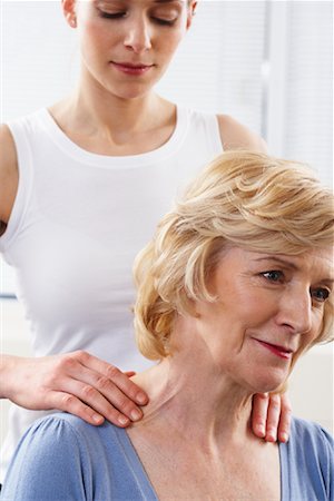 Woman Getting Neck Massaged Foto de stock - Con derechos protegidos, Código: 700-02071762