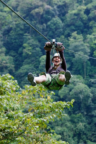 Woman on Zip Line, Arenal Volcano, Alajuela, Costa Rica Stock Photo - Premium Rights-Managed, Artist: Jeremy Woodhouse, Image code: 700-02080161